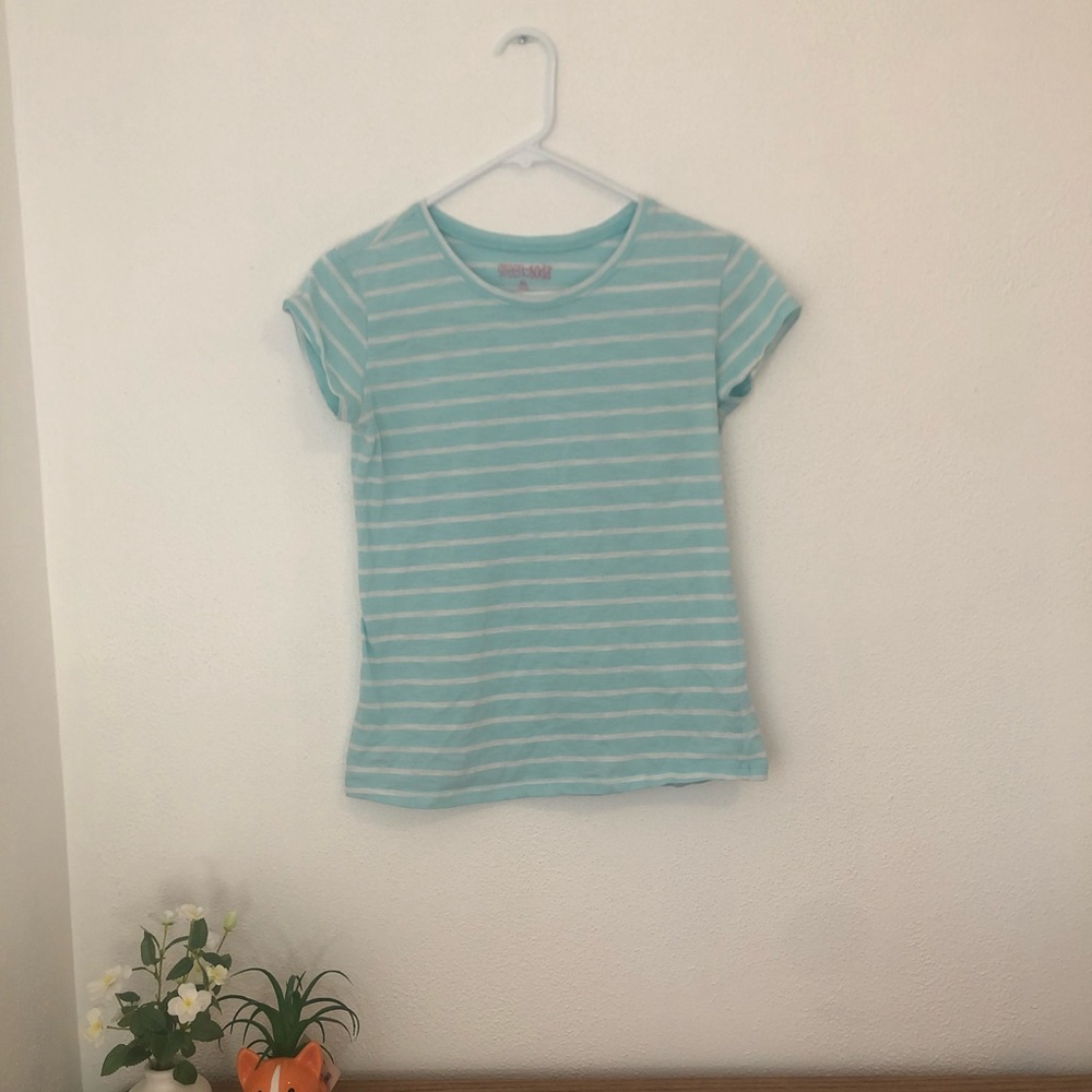 A nice t-shirt with pastel blue and white stripes.
